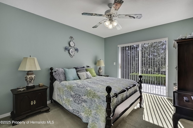 17364 Mediterranean Cir, Brooksville, FL 34614 - carpeted bedroom with access to outside, baseboards, and a ceiling fan