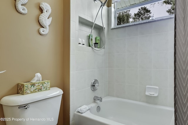 17364 Mediterranean Cir, Brooksville, FL 34614 - bathroom featuring shower / tub combo with curtain and toilet