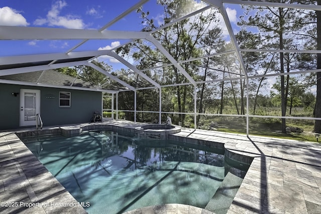 17364 Mediterranean Cir, Brooksville, FL 34614 - view of swimming pool with a patio, a pool with connected hot tub, and glass enclosure
