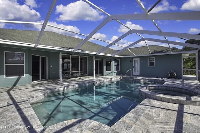 17364 Mediterranean Cir, Brooksville, FL 34614 - view of pool with a patio area, a pool with connected hot tub, and a lanai