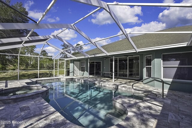 17364 Mediterranean Cir, Brooksville, FL 34614 - view of swimming pool with a patio area, a pool with connected hot tub, and glass enclosure