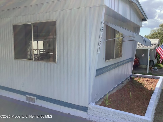 view of side of property featuring crawl space