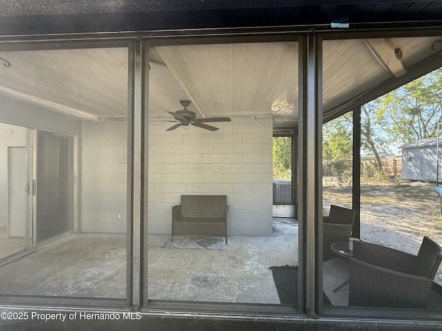 view of patio featuring ceiling fan