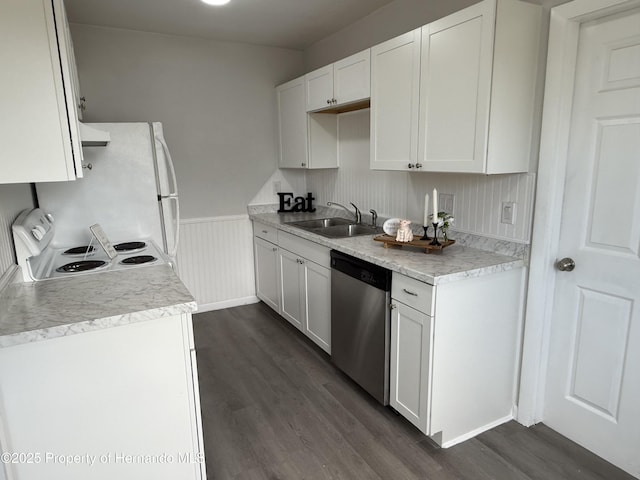 6339 Holiday Dr, Spring Hill, FL 34606 - kitchen with white appliances, dark wood finished floors, a sink, extractor fan, and wainscoting