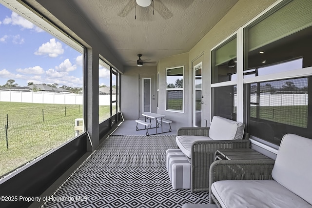 12848 Hilary St, Spring Hill, FL 34609 - sunroom featuring ceiling fan