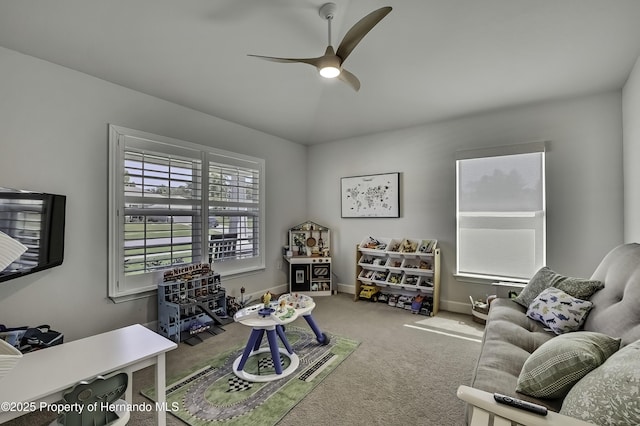 12848 Hilary St, Spring Hill, FL 34609 - interior space featuring ceiling fan, baseboards, and carpet