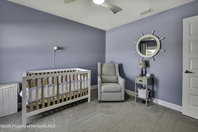 12848 Hilary St, Spring Hill, FL 34609 - bedroom with a nursery area, visible vents, baseboards, and carpet flooring
