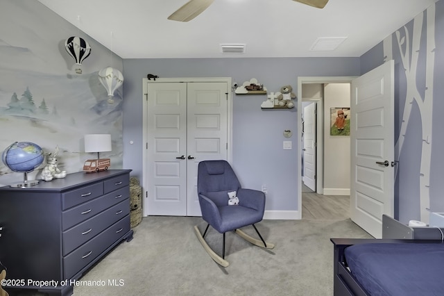 12848 Hilary St, Spring Hill, FL 34609 - bedroom featuring visible vents, baseboards, a closet, and light colored carpet
