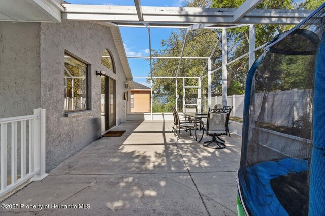 4405 Plumosa St, Spring Hill, FL 34607 - view of patio / terrace featuring fence and outdoor dining space