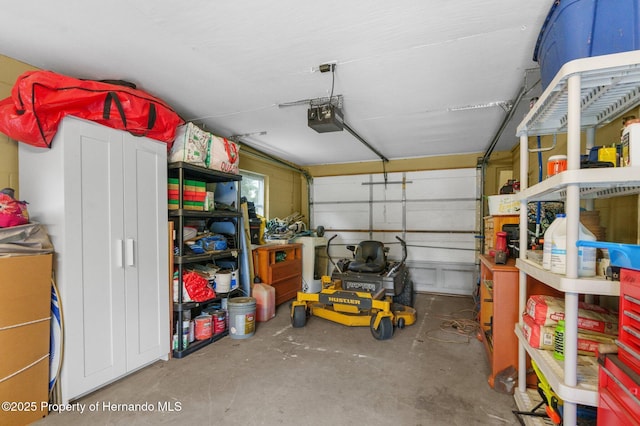garage featuring a garage door opener