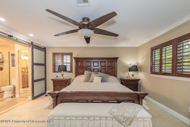 bedroom featuring crown molding, multiple windows, visible vents, and a barn door