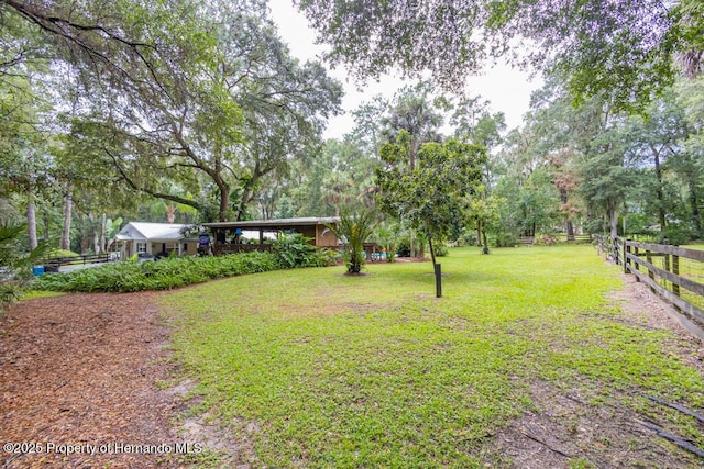 view of yard featuring fence