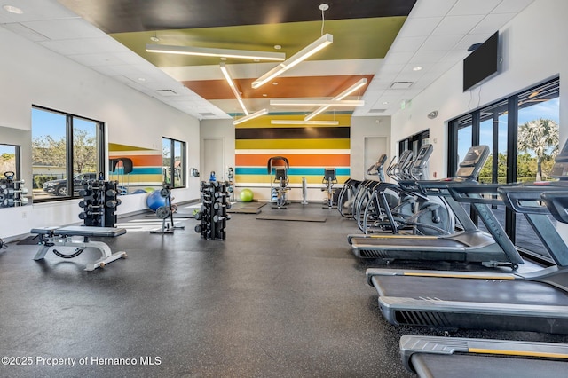 gym featuring a high ceiling