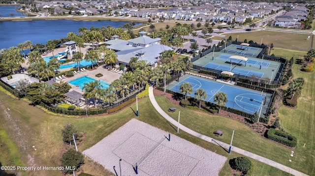 aerial view with a residential view and a water view