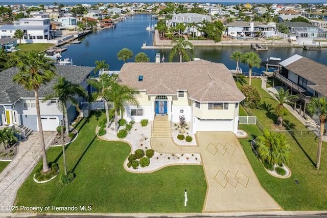 4285 Flexer Dr, Hernando Beach, FL 34607 - aerial view with a residential view and a water view
