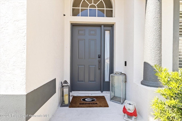 262 W Romany Loop, Beverly Hills, FL 34465 - entrance to property featuring stucco siding