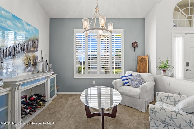 262 W Romany Loop, Beverly Hills, FL 34465 - living area featuring baseboards, carpet floors, and a notable chandelier