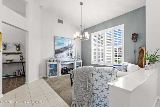 262 W Romany Loop, Beverly Hills, FL 34465 - tiled dining room featuring vaulted ceiling, baseboards, visible vents, a notable chandelier, and carpet floors