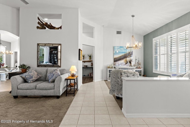 262 W Romany Loop, Beverly Hills, FL 34465 - living room featuring a notable chandelier, light tile patterned flooring, and visible vents