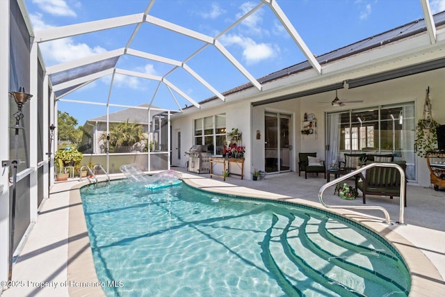 262 W Romany Loop, Beverly Hills, FL 34465 - outdoor pool with grilling area, a lanai, a ceiling fan, and a patio
