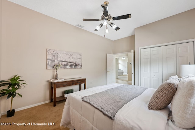 4469 Lake In The Woods Dr, Weeki Wachee, FL 34607 - bedroom with light colored carpet, a closet, ceiling fan, baseboards, and visible vents