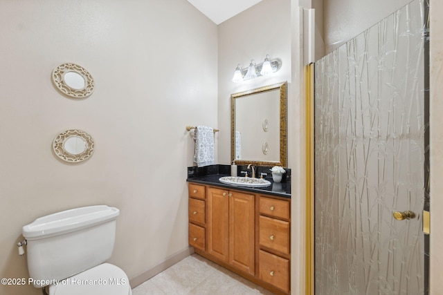 4469 Lake In The Woods Dr, Weeki Wachee, FL 34607 - bathroom featuring tile patterned floors, baseboards, toilet, and vanity
