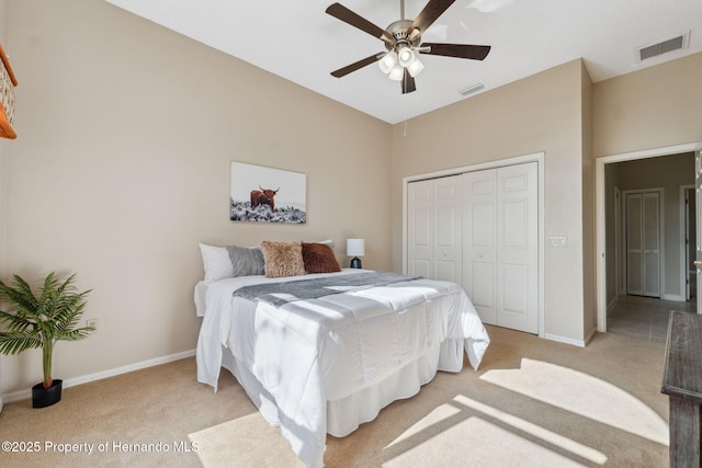 4469 Lake In The Woods Dr, Weeki Wachee, FL 34607 - bedroom featuring a closet, visible vents, and light colored carpet