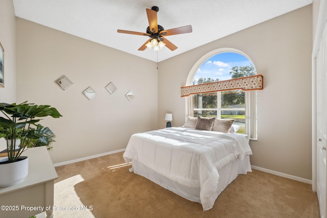 4469 Lake In The Woods Dr, Weeki Wachee, FL 34607 - carpeted bedroom featuring ceiling fan and baseboards