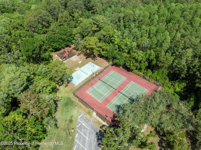 4469 Lake In The Woods Dr, Weeki Wachee, FL 34607 - aerial view with a forest view