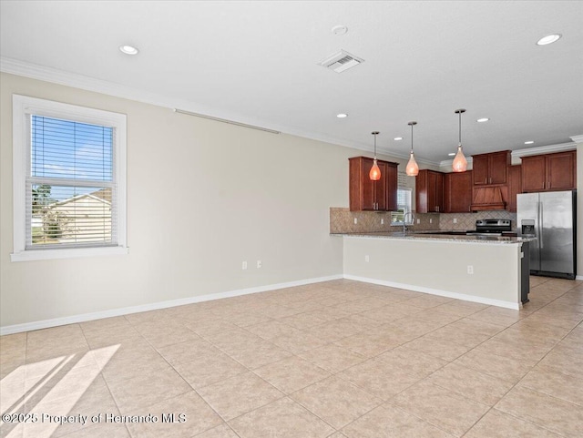 kitchen with stainless steel appliances, crown molding, plenty of natural light, decorative backsplash, and recessed lighting