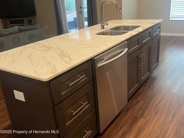 15297 Myland Rd, Weeki Wachee, FL 34614 - kitchen with dark wood finished floors, stainless steel dishwasher, a healthy amount of sunlight, and a sink