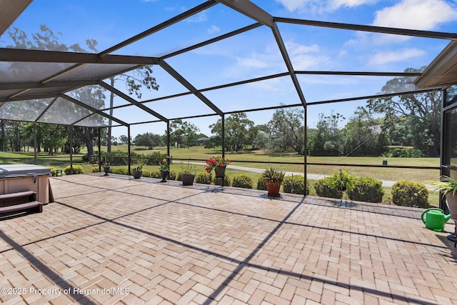 9208 Butler Blvd, Weeki Wachee, FL 34613 - view of patio / terrace with glass enclosure and a hot tub