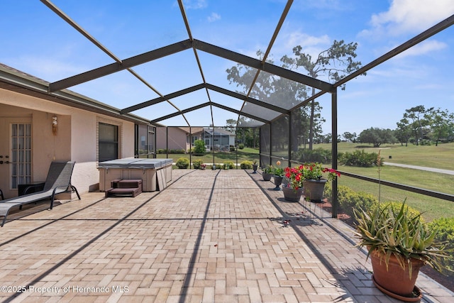 9208 Butler Blvd, Weeki Wachee, FL 34613 - view of patio / terrace with a lanai and a hot tub