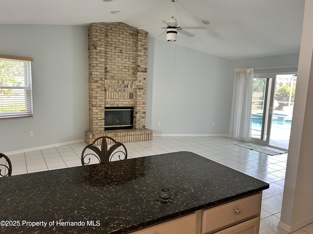 10519 Audie Brook Dr, Spring Hill, FL 34608 - unfurnished living room with light tile patterned flooring, lofted ceiling, healthy amount of natural light, and ceiling fan