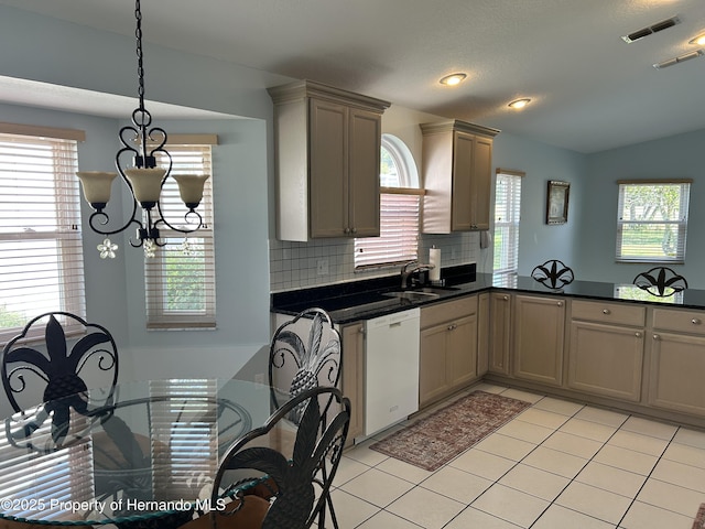 10519 Audie Brook Dr, Spring Hill, FL 34608 - kitchen with dishwasher, a chandelier, a sink, healthy amount of natural light, and vaulted ceiling