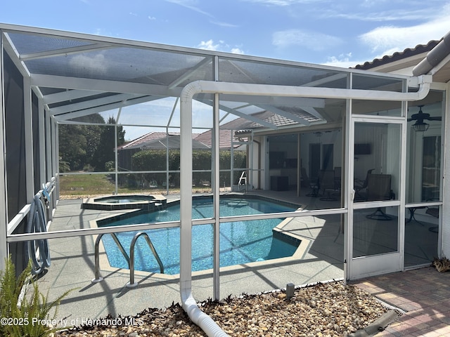 10519 Audie Brook Dr, Spring Hill, FL 34608 - view of swimming pool with a lanai, a patio area, and a pool with connected hot tub