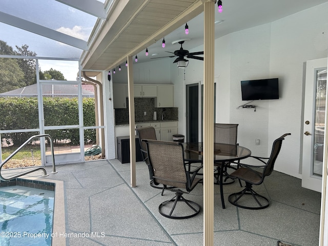 10519 Audie Brook Dr, Spring Hill, FL 34608 - view of patio / terrace featuring ceiling fan and glass enclosure