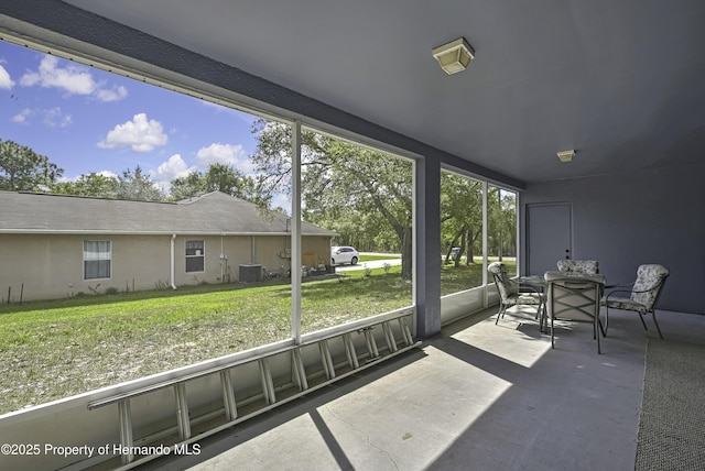 11257 Persimmon Ave, Weeki Wachee, FL 34614 - sunroom / solarium featuring outdoor dining area