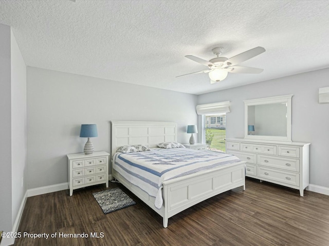 18441 Whitacre Cir, Hudson, FL 34667 - bedroom with a textured ceiling, a ceiling fan, baseboards, and dark wood finished floors