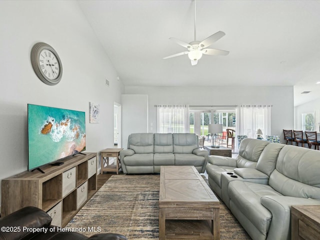 18441 Whitacre Cir, Hudson, FL 34667 - living area with high vaulted ceiling, wood finished floors, and ceiling fan