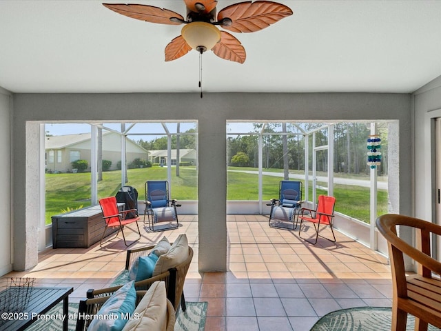 18441 Whitacre Cir, Hudson, FL 34667 - sunroom with a wealth of natural light and a ceiling fan