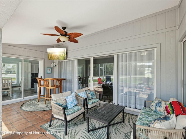 18441 Whitacre Cir, Hudson, FL 34667 - sunroom featuring outdoor lounge area, ceiling fan, and tile patterned flooring