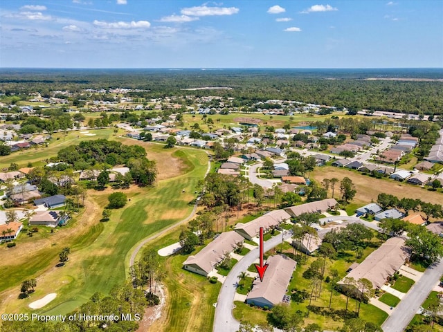18441 Whitacre Cir, Hudson, FL 34667 - drone / aerial view featuring golf course view and a residential view