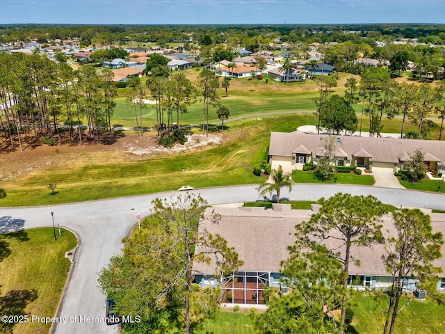 18441 Whitacre Cir, Hudson, FL 34667 - aerial view with golf course view and a residential view