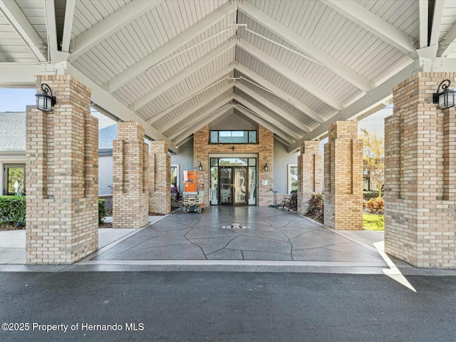 18441 Whitacre Cir, Hudson, FL 34667 - view of exterior entry featuring brick siding