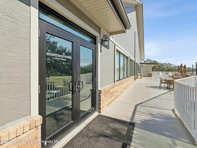 18441 Whitacre Cir, Hudson, FL 34667 - exterior space featuring french doors