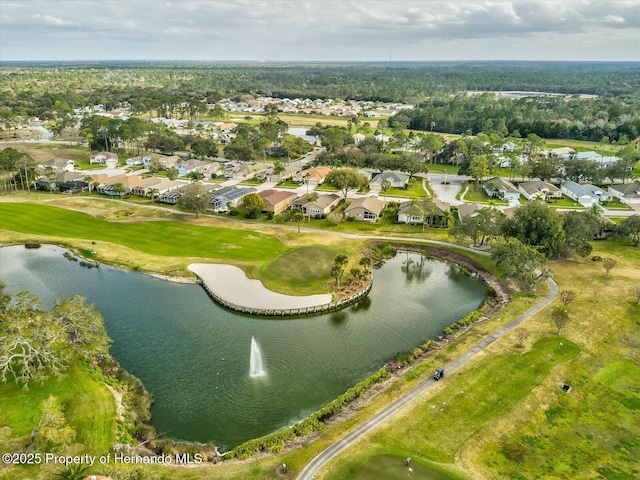 18441 Whitacre Cir, Hudson, FL 34667 - drone / aerial view featuring golf course view, a residential view, and a water view