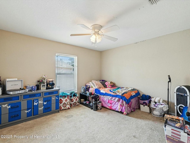 carpeted bedroom featuring a ceiling fan