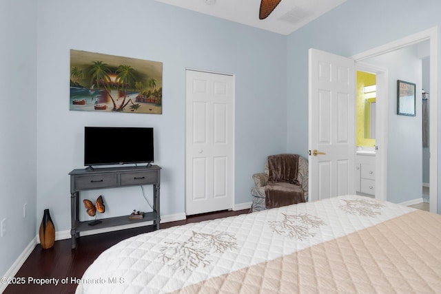bedroom with baseboards, visible vents, and dark wood-style floors