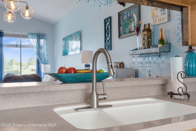 room details featuring a dry bar and a sink